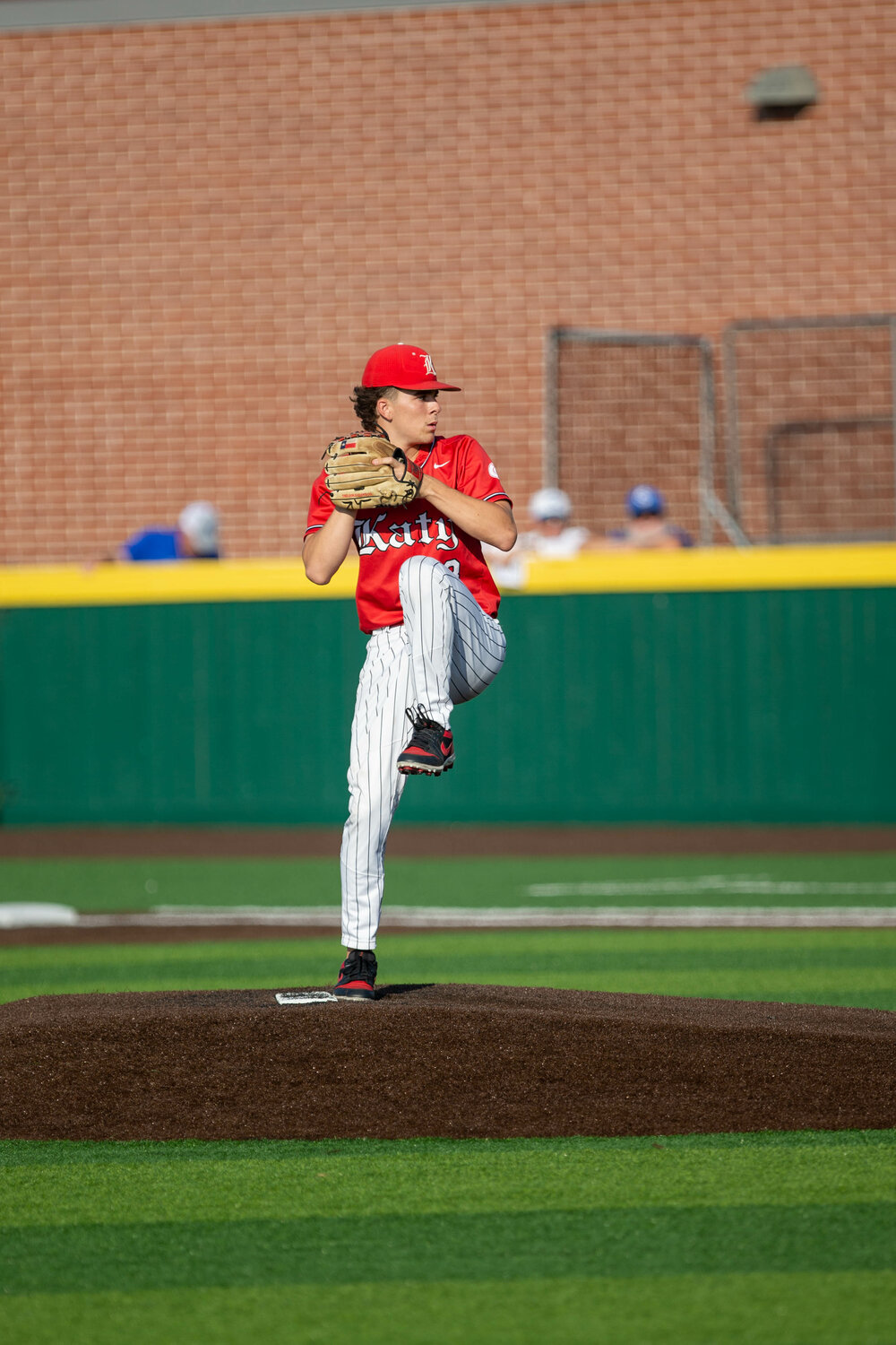 Caleb Koger pitches during Wednesday's Regional Semifinal between Katy and Clear Springs at Deer Park.